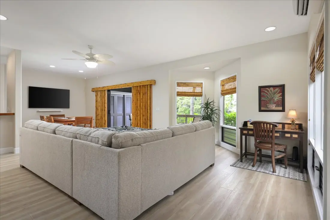 Living room with workspace by the windows