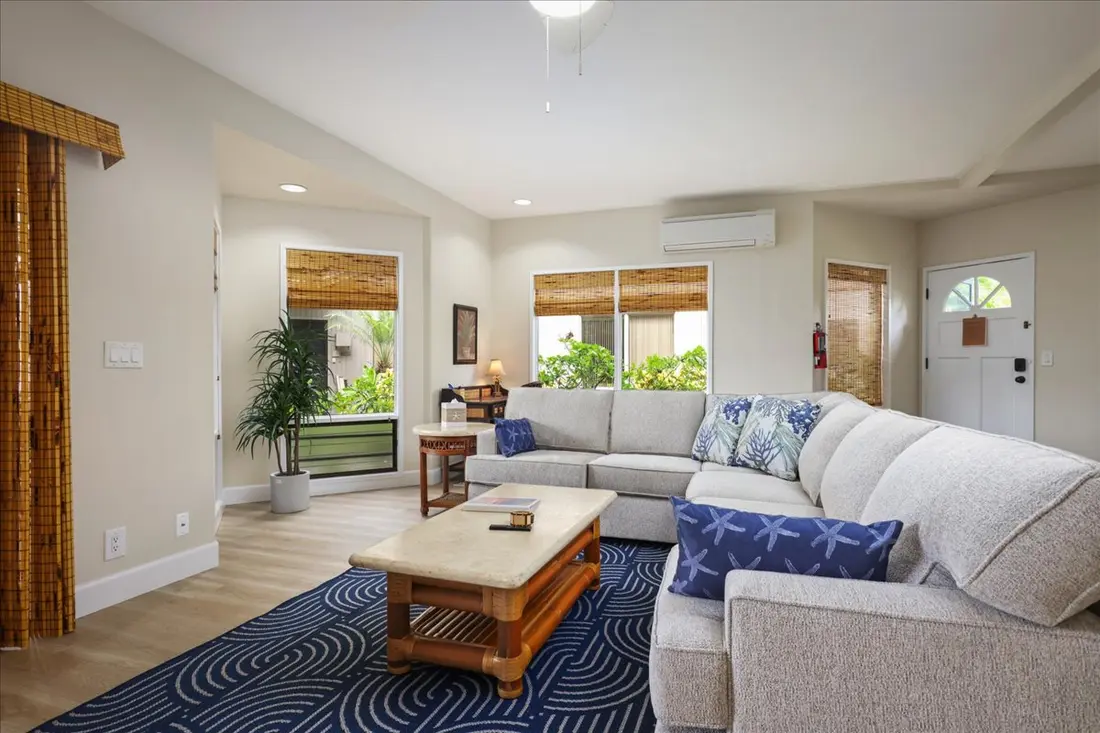 Living room beside sliding lanai doors