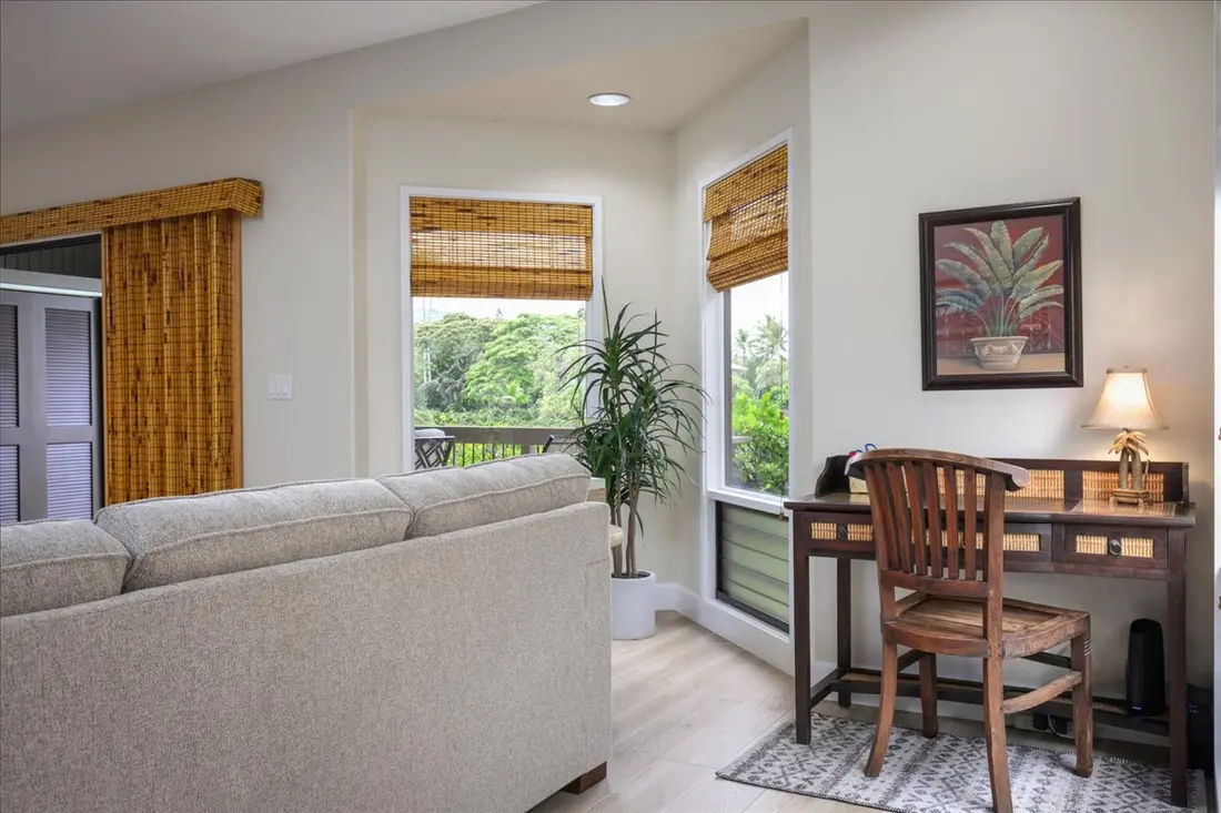 Desk beside windows with tropical views