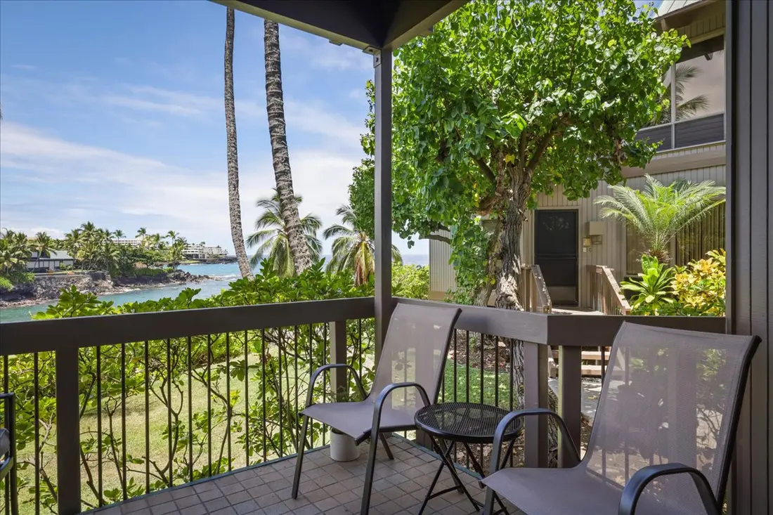 Two chairs on a private bedroom lanai