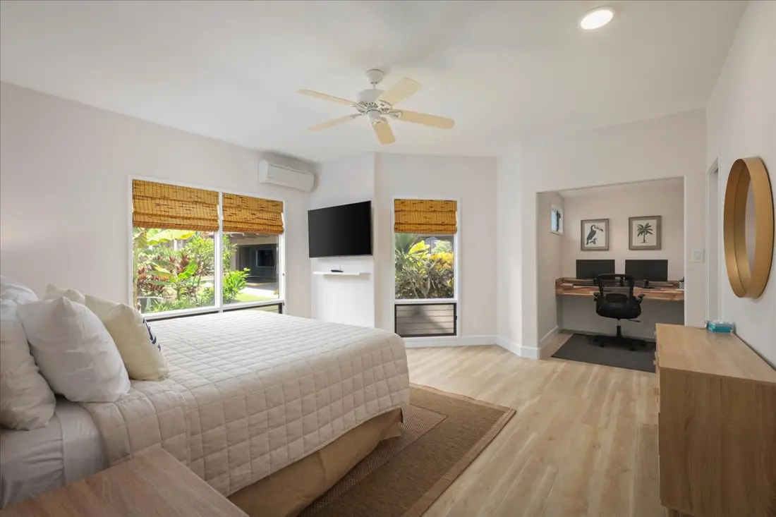 Primary king bedroom with workspace