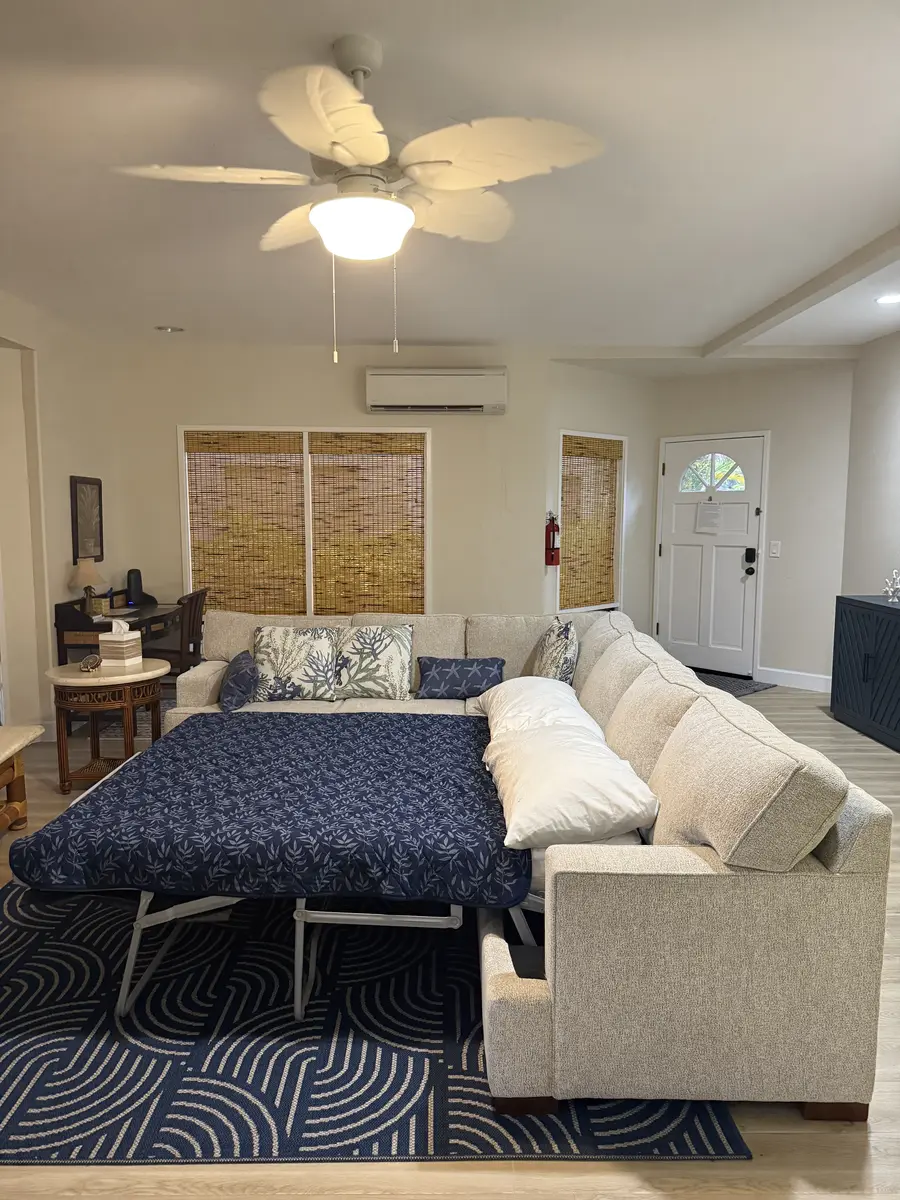 Living room with queen sleeper sofa set up